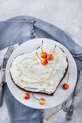 Delicious heart shaped vanilla and cream Three milk cake