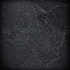 Dark grey black slate background or texture. black stone