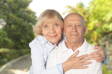 Fototapeta premium Portrait of happy senior couple smiling