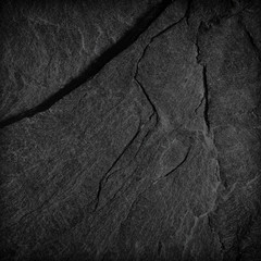 Dark grey black slate background or texture.