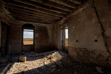 Fototapeta na wymiar Light entrances in an abandoned and ruined room