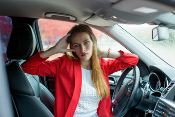 young woman in a car