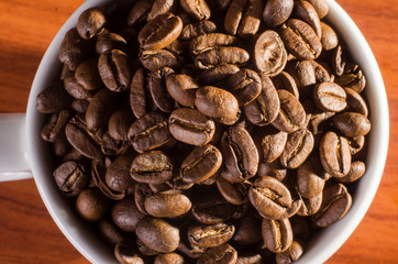 many freshly roasted coffee beans