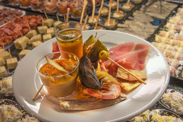 Eating tapas, elaborated food snacks,  in Spain.