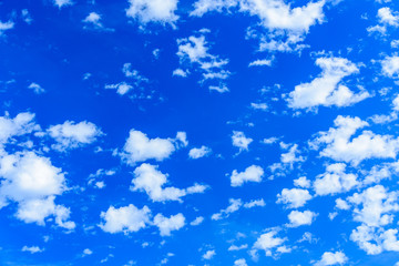White fluffy clouds in the blue sky