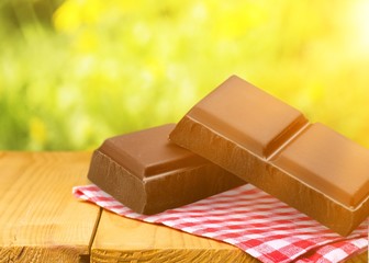 Two pieces of chocolate isolated on white background