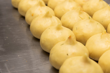 Manufacture of "Coxinha de Frango", traditional Brazilian snacks stuffed with chicken