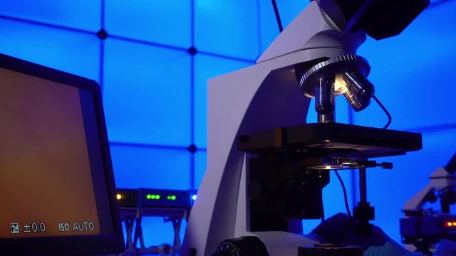 Microscope in science laboratory. Research of material structure