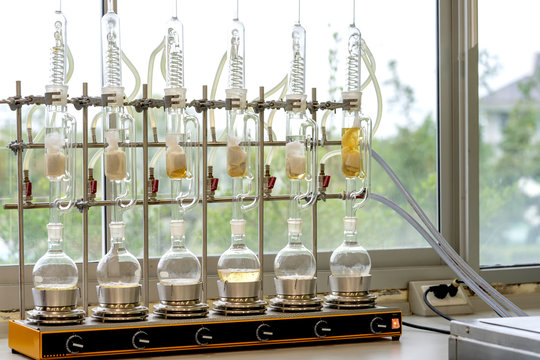 Soxhlet Extractor.Percolator-boiler and reflux,distillation flask on heating element.Organic chemistry class.