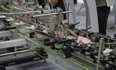 Fototapeta na wymiar Package printing machine from printing to finishing