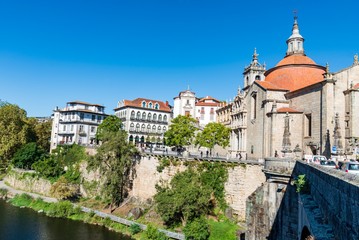 Fototapeta premium View of São Gonçalo church from across the Tamega River in Amarante, Portugal.