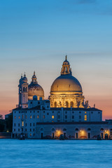 Fototapeta na wymiar Church Basilica di Santa Maria della Salute in Venice, Italy under sunset