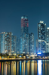 Fototapeta na wymiar Night scene of skyline and harbor of Hong Kong city