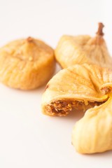 Dried figs isolated against white