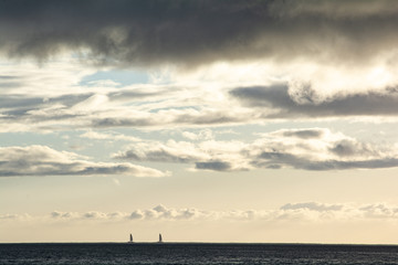 Fototapeta na wymiar sails on the horizon