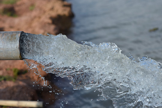 water flow out from pipe by pump supply for dry season