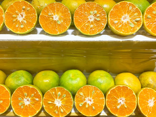 Fresh orange  fruit slice . Healthy food, many orange fruit .