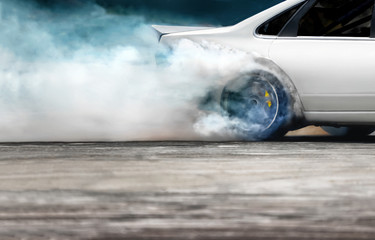 Race drift car burning tires on speed track © toa555