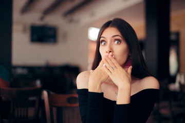 Polite Woman Covering Her Mouth at the Table 