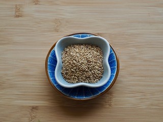 Sesame seeds in a ceramic bowl