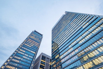 Obraz na płótnie Canvas Windows of skyscraper business office buildings, Corporate building in Tokyo City, Japan. Business concept.