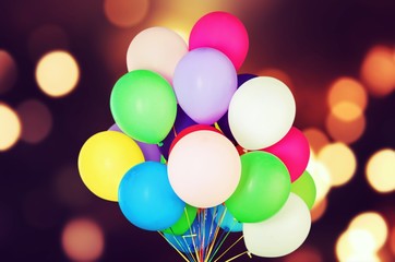 Bunch of colorful balloons on background