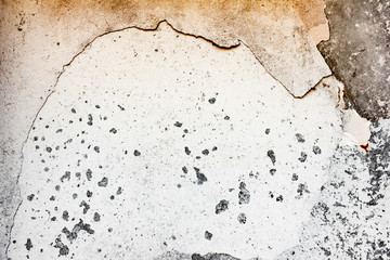 Texture of a concrete wall with cracks and scratches which can be used as a background