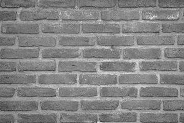 Abstract Wall black brick wall texture background pattern, brick surface backgrounds. Vintage Brickwork or stonework flooring interior rock old clean concrete grid uneven, wallpaper bricks design.