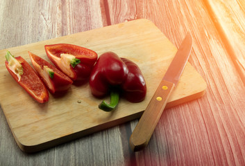 Closeup  fresh  Red, Yellow, Green, bell pepper or sweet pepper or capsicum  isolate on  chopping wood ,raw food ingredient concept.