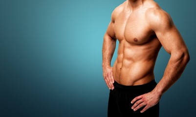 Cropped image of fit muscular body of sportsman