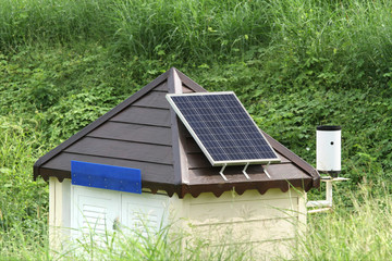 Solar panel on roof of survey measurement point house