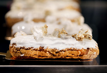 Photo background macro of a delicious vanilla Eclair