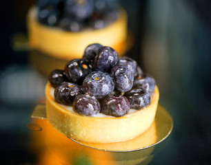 Photo background macro of a delicious blueberry cake