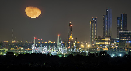 Oil refinery industry plant along twilight morning