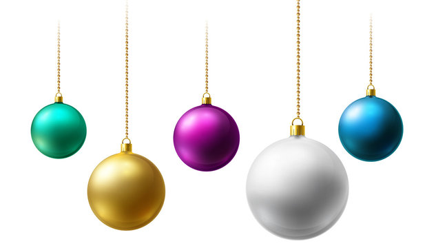 Realistic Christmas balls hanging on gold beads chains on white background.