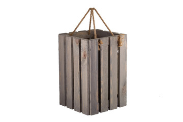 Wooden box on a white background. Big box with handle rope