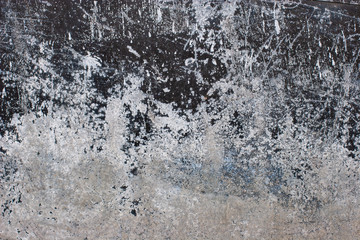 Fototapeta na wymiar Abstract grunge background. Old rusty metal with corrosion, scratches and scuffs. The paint color is black and white.
