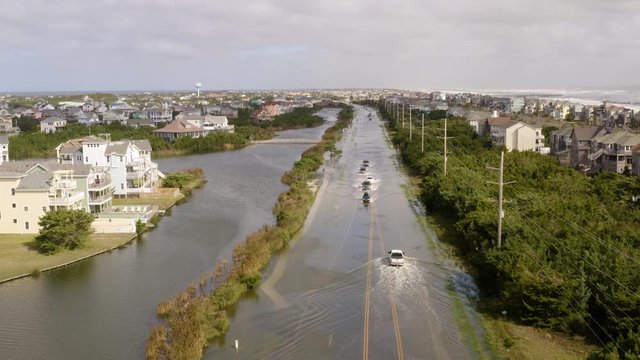 Aerial view of flooded city Avon, flying above town 4k