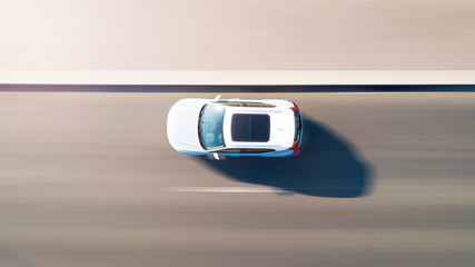 Aerial top down view of the white car moving fast