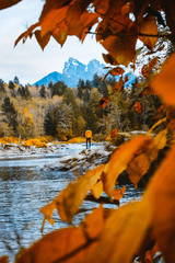 Man near the river in the mountains