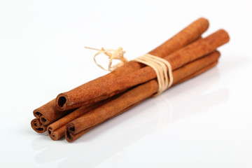 cinnamon sticks on white background