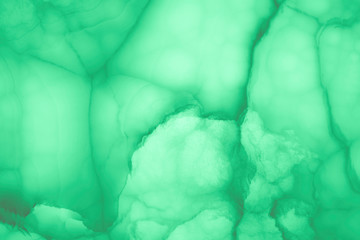Abstract marble background in mint green color. Texture of marble surface great for design. Close up.