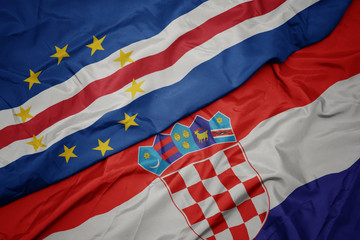 waving colorful flag of croatia and national flag of cape verde.