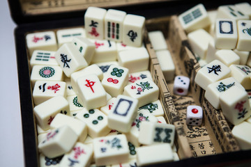 Fototapeta na wymiar Pile of Mahjong ancient asian game in the wooden box