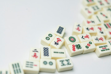 Fototapeta na wymiar Pile of Mahjong ancient asian game on the white background 
