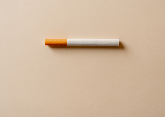 Conceptual image of cigarette isolated. Stop smoking advertising campaign