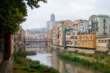 historical jewish quarter in Girona with Eiffel Bridge at sunrise, Barcelona, Spain, Catalonia