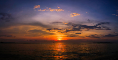 Panorama beautiful sunset and blue sky on the beach.