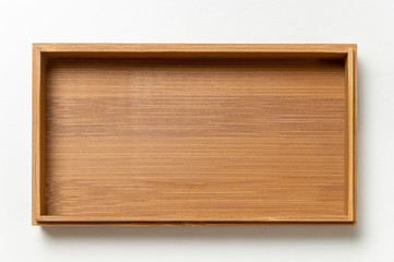 open wooden box top view on white background