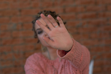 Woman bondage in angle of abandoned building image blur , stop violence against Women, international women's day